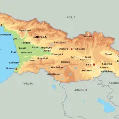Mapa polityczna Gruzji z zaznaczonymi miastami i sąsiadującymi krajami: Rosją, Turcją, Armenią i Azerbejdżanem. Gdzie leży Gruzja? Na Kaukazie, nad Morzem Czarnym.